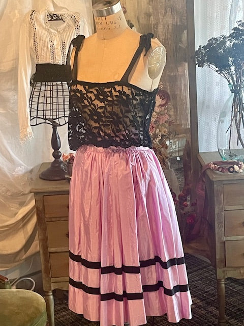 1950's PINK FULL SKIRT WITH BLACK RIBBON TRIM